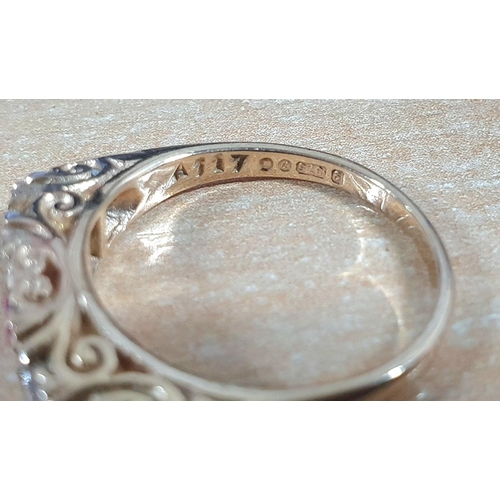 97 - 9ct yellow gold and pink Sapphire ring interspersed between 2 clear stones, possibly CZ,

3.5 grams ... 