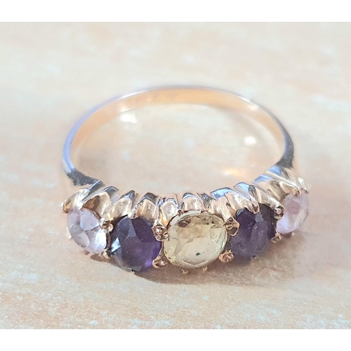 98 - Antique ring, marked 18ct containing a large oval cut yellow Sapphire which is flanked by oval cut A... 