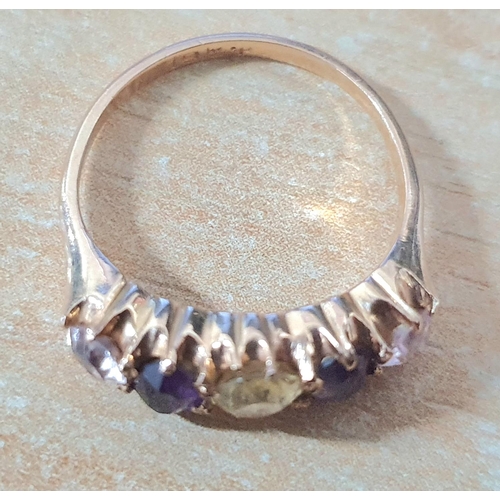 98 - Antique ring, marked 18ct containing a large oval cut yellow Sapphire which is flanked by oval cut A... 