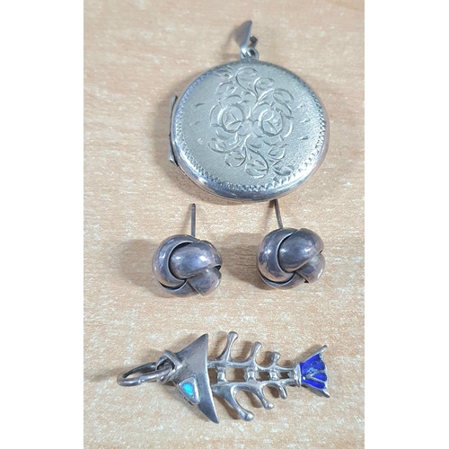 100 - Collection of silver jewellery to include a large circular locket, 2 silver pendants and 2 and half ... 