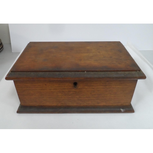 115 - Antique Mahogany box with contents to includ a harmonica, white metal card cases, pen knives etc (Qt... 
