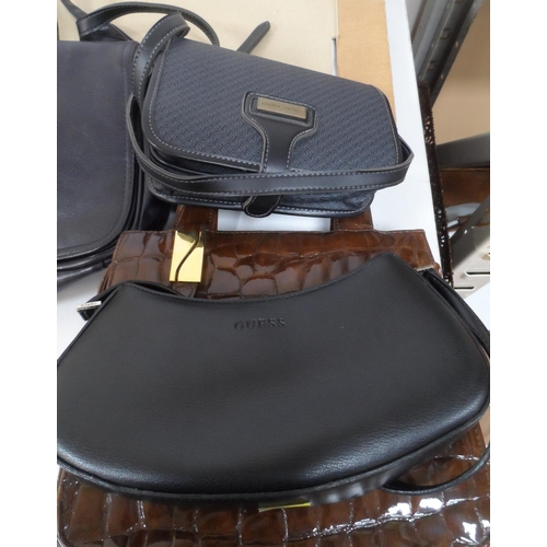 125 - Four designer handbags, mostly unused, as new, including Guess (4)