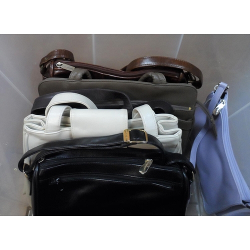 128 - Eleven designer handbags, mostly unused, as new, by Jane Shilton (11)