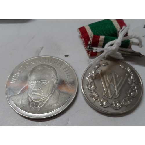 176 - Cased Women's Voluntary Service medal together with a cased Cabinet War Rooms nickel-silver coin (2)