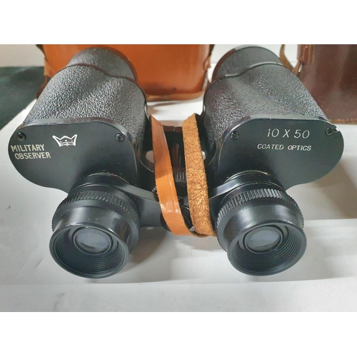 86 - Two pairs of military regulation binoculars together with a pair of antique opera glasses (3)