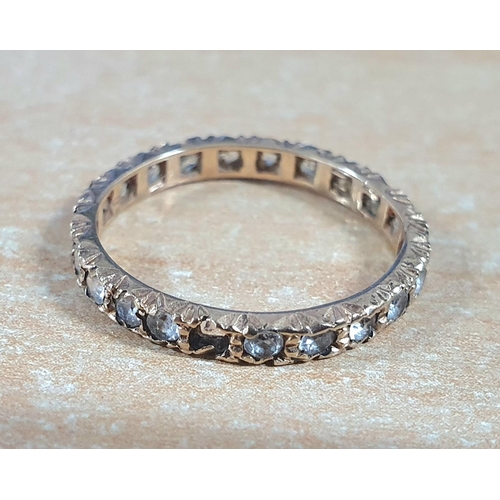 53 - 9ct gold eternity ring containing diamonds and semi-precious stones (a/f),

1.7 grams gross         ... 