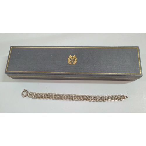 19 - Heavy and ornate ladies silver bracelet in presentation box