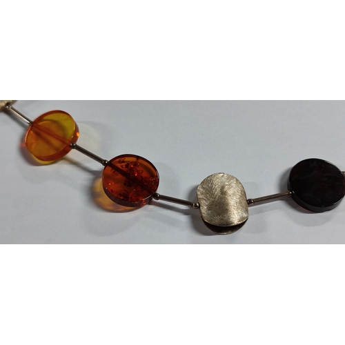 55 - Fine quality, Silver and Amber necklace

17.2 grams gross