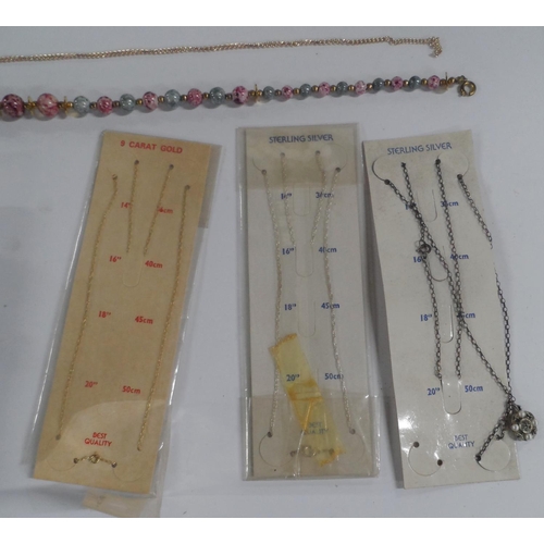 24 - Collection of good quality costume jewellery including a fine 9ct gold and silver chains (Qty)