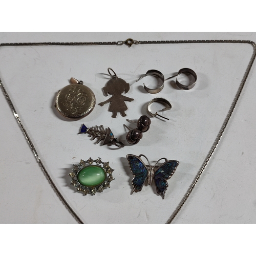 16 - A silver necklace, locket, charms, bracelet etc (Qty)

38 grams