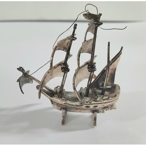 3 - Chinese unmarked, white metal miniature model of a galleon,

42 grams             6cm long