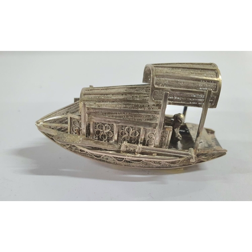 4 - Chinese unmarked, white metal miniature model of a sailing junk,

21.5 grams            6 cm long