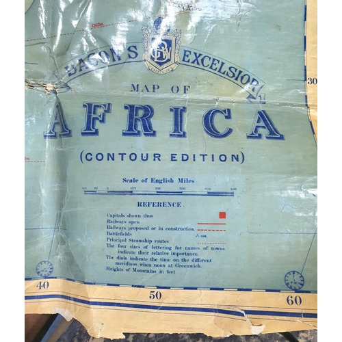 94 - Large mid 20thC school hanging map of Africa (a/f) together with a framed reproduction map of the wo... 