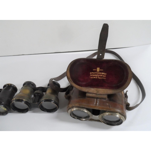 141 - Two pairs of antique cased binoculars together with 2 pairs of old opera glasses (4)