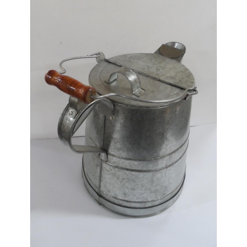 142 - Large metal milk kettle