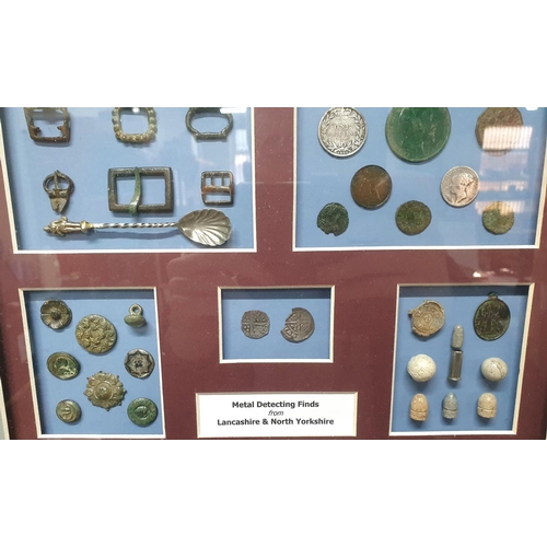 232 - Well framed display of metal detecting finds