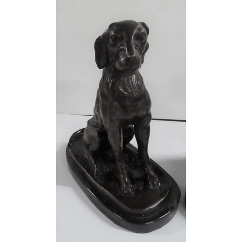 272 - Pair of unsigned bronze of seated dogs