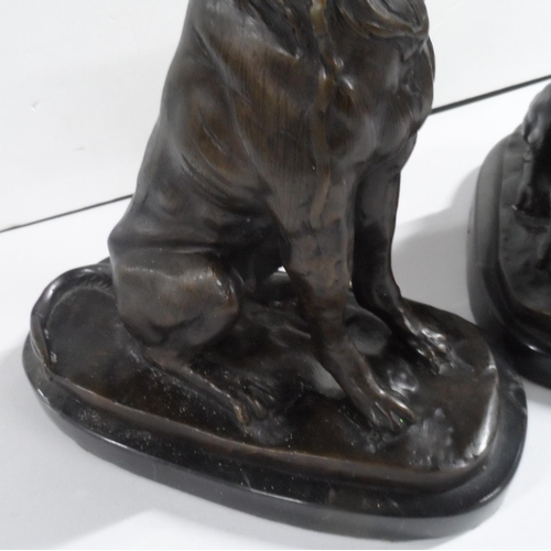 272 - Pair of unsigned bronze of seated dogs