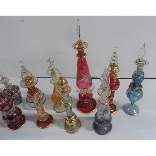 83 - Large quanity of coloured glass perfume bottles (Qty)