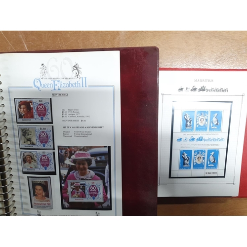 63A - Two albums relating to world stamp sets commemorating the reign of QE II (2)