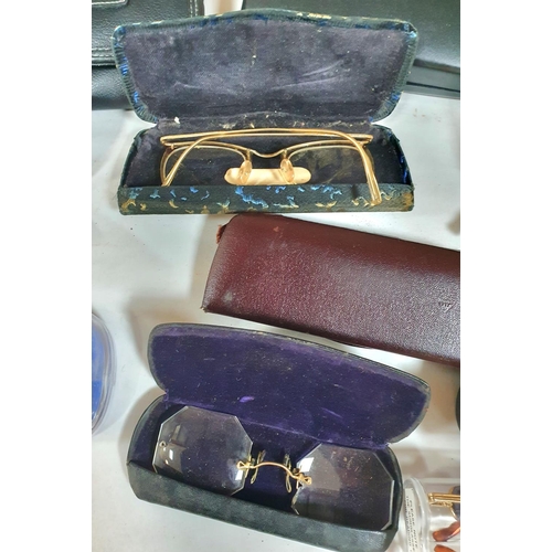 179 - Collection of purses and cased spectacles including a few old examples (Qty)