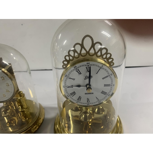 212 - Two glass domed carriage clocks (2)