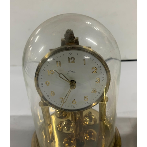 212 - Two glass domed carriage clocks (2)