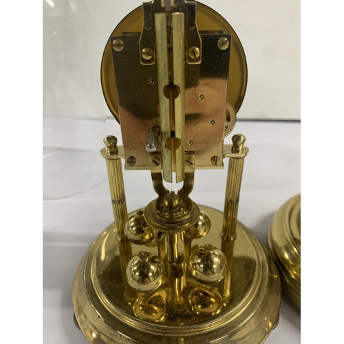 212 - Two glass domed carriage clocks (2)