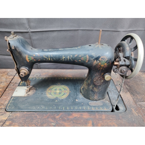 237 - Vintage Singer sewing machine, table and accessories