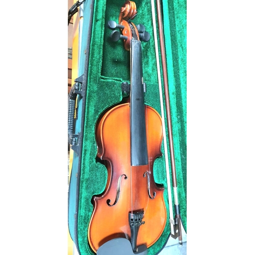 273 - Violin, bow and soft carry case