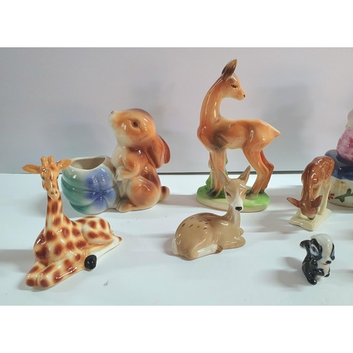 336 - Collection of animal figurines to include Wade, Keele Street Pottery, Disney etc (Qty)