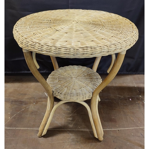 648 - A round wicker table together with an oak and iron framed mirror, a/f, (2)