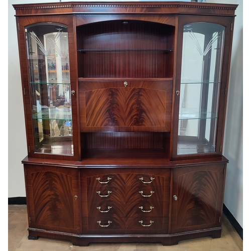 660 - Large display cabinet with drop-down front revealing mirrored central section above four drawers and... 