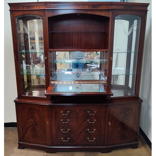 660 - Large display cabinet with drop-down front revealing mirrored central section above four drawers and... 