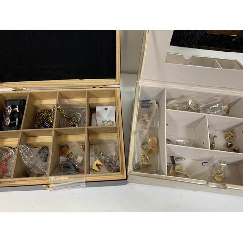 209 - Two jewellery boxes containg a large quantity of cuff-links and other costume jewellery (Qty)