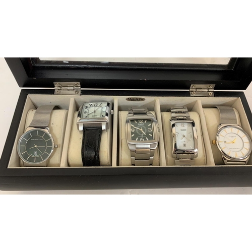 252 - Two Mele & Co watch display cases together with 10 gents, as new wrist watches including Loaded and ... 