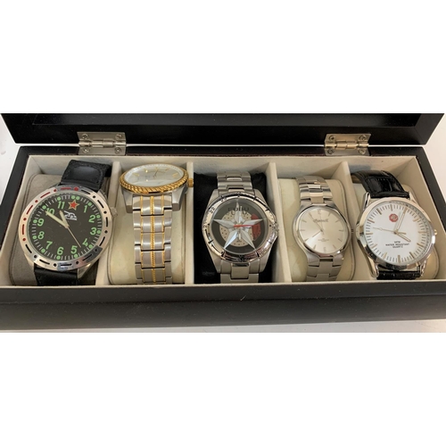 252 - Two Mele & Co watch display cases together with 10 gents, as new wrist watches including Loaded and ... 