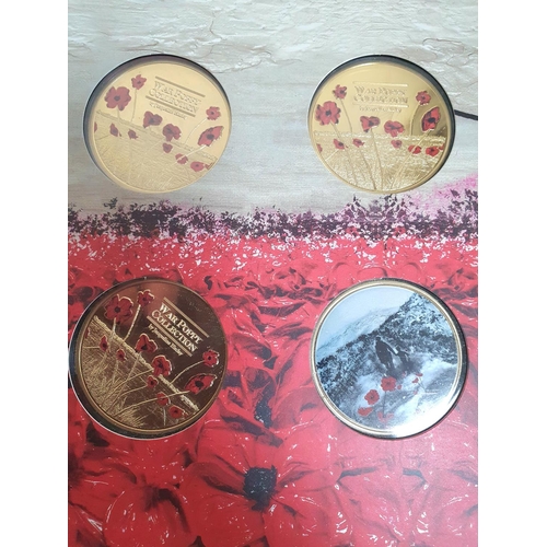 412 - War Poppy Collection by Jacqueline Hurley 4 x 24ct gold plated coin set together with another simila... 