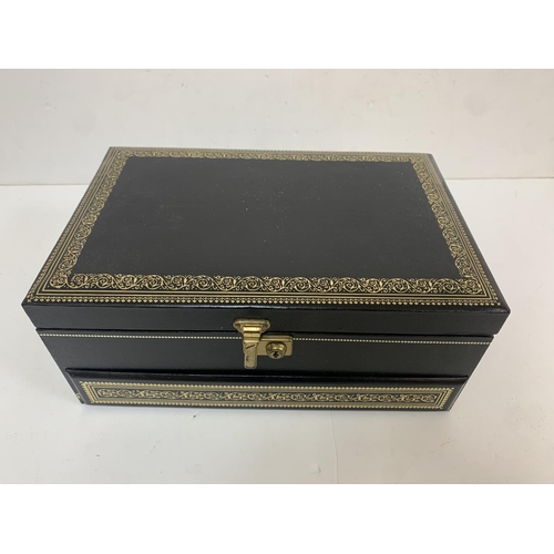 321 - Fine quality, leather covered jewellery box with contents of costume jewellery