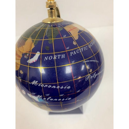 343 - Hardstone globe inlaid with clock