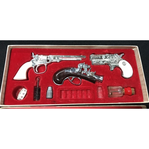 385 - The Outlaw presentation of miniature antique firearms