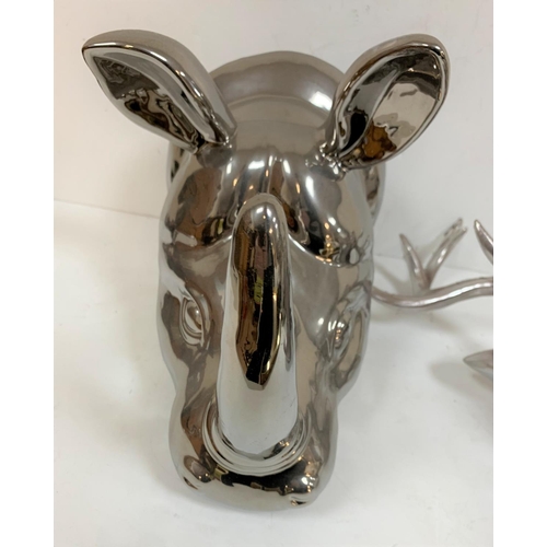 431 - High quality, unmarked silver coloured ceramic Rhino ead together with a similar Stags head (2)