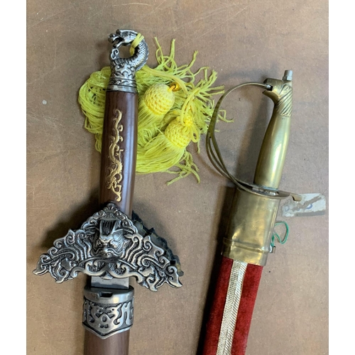 433 - Replica sword together with an brass handled Indian sword (2)