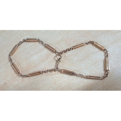 8 - Unusual figure of eight, fold over barred bracelet in 9ct rose gold,

20 grams