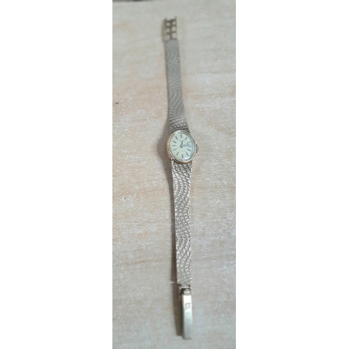 22 - Ladies vintage Tissot cocktail watch with 9ct case and strap,

18 grams gross