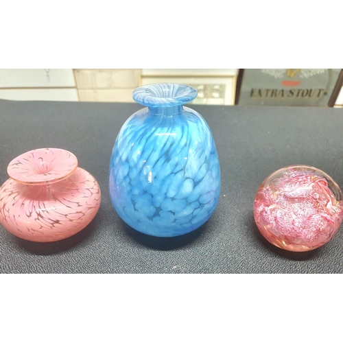 85 - Five pieces of Mdina including a large blue bottle together with vases and paper weights (5)