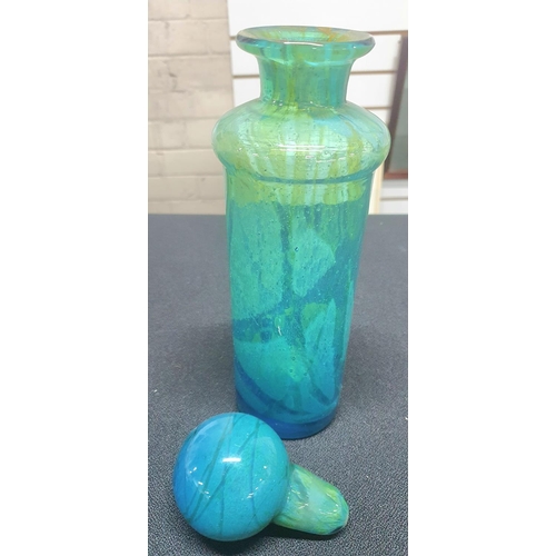 85 - Five pieces of Mdina including a large blue bottle together with vases and paper weights (5)