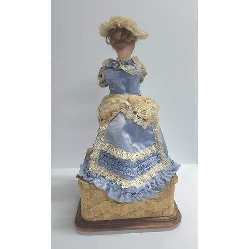 30 - Late 19thC French musical automaton doll with elevating arms and rotating head (bisque) attributed t... 