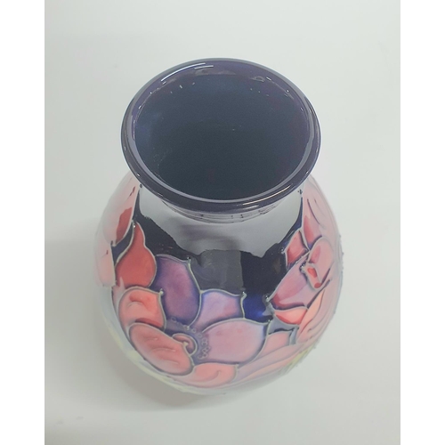 96 - Moorcroft bulbus Anemone pattern vase,

20 cm tall