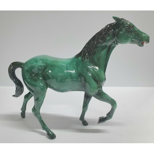 92 - Beswick horse with rare green colouring,

approx 26cm long by 21cm tall